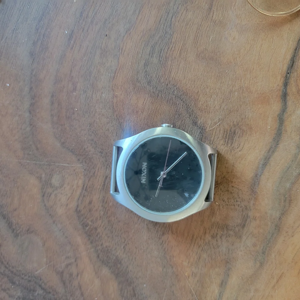Nixon Silver Smartwatch Case with Industrial Design